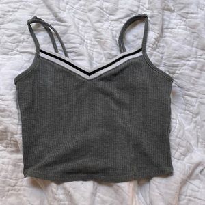 Cropped, gray, ribbed tank top.